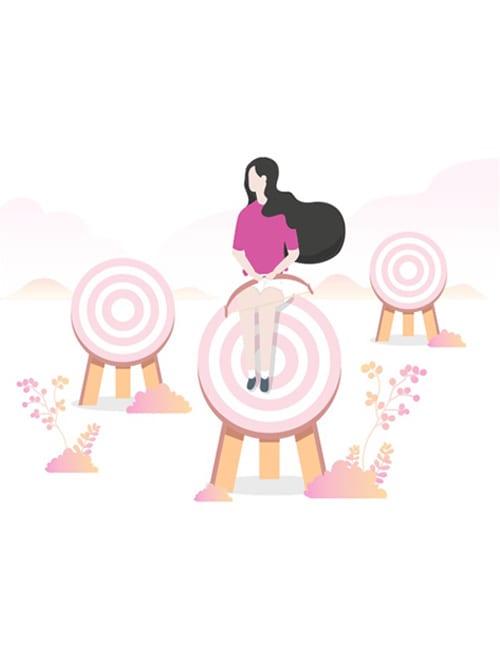 A Woman sitting on pink target