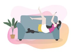 A girl lying on sofa looking at phone